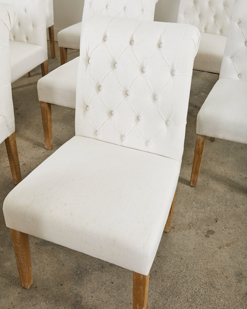 Set of Fourteen Tufted Scroll Back Dining Chairs