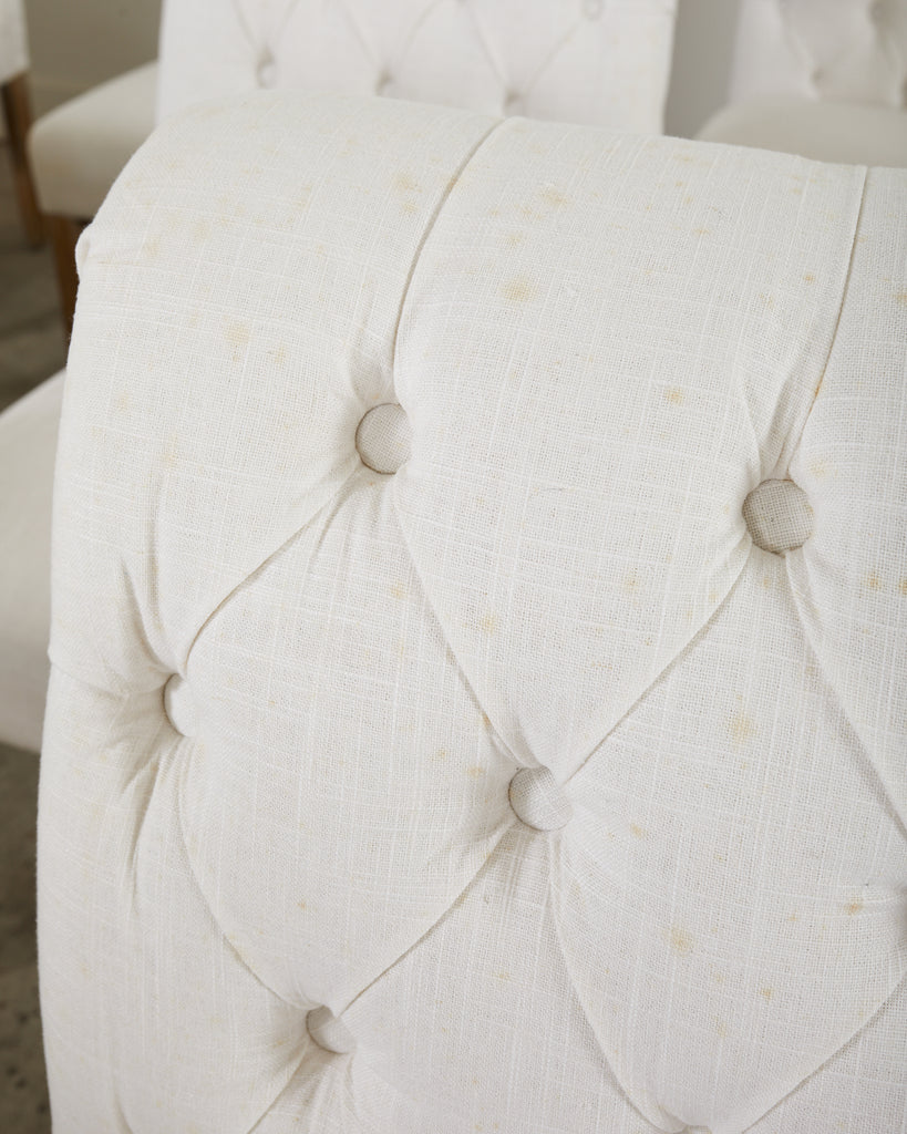 Set of Fourteen Tufted Scroll Back Dining Chairs