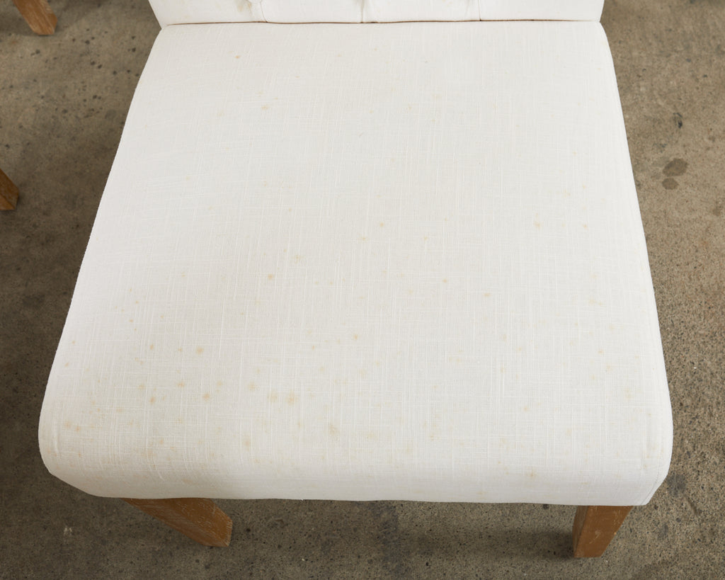 Set of Fourteen Tufted Scroll Back Dining Chairs