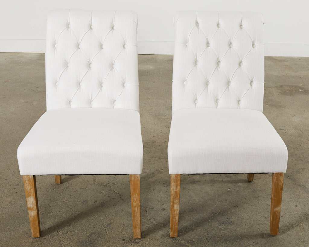 Set of Fourteen Tufted Scroll Back Dining Chairs
