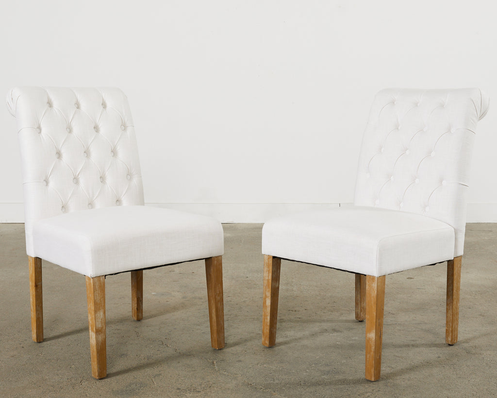 Set of Fourteen Tufted Scroll Back Dining Chairs