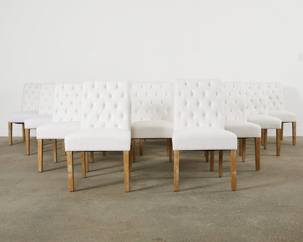 Set of Fourteen Tufted Scroll Back Dining Chairs