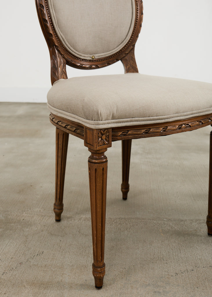 Set of Four French Louis XVI Style Walnut Dining Chairs