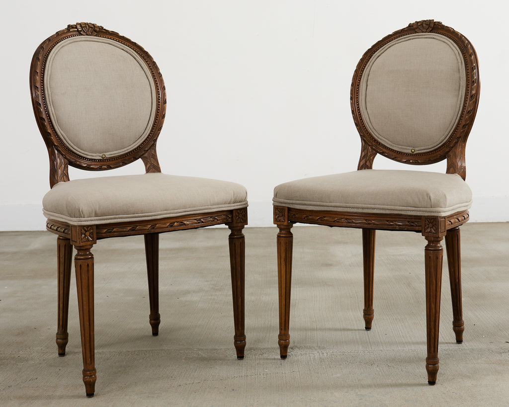 Set of Four French Louis XVI Style Walnut Dining Chairs