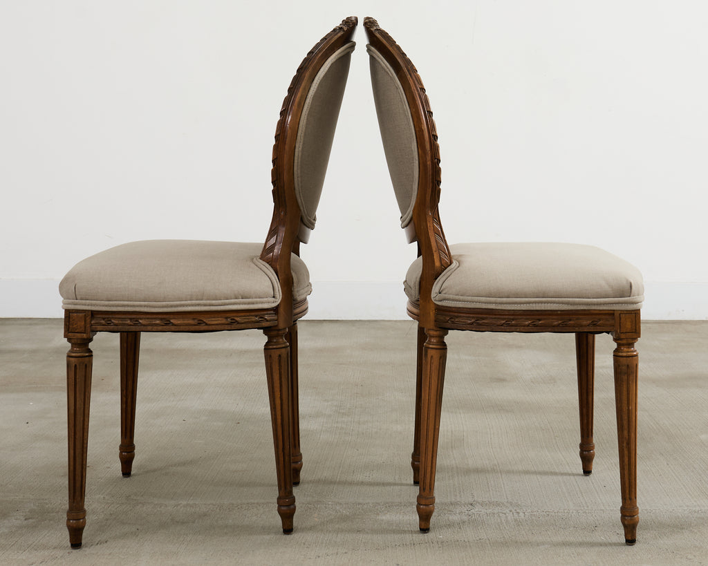 Set of Four French Louis XVI Style Walnut Dining Chairs