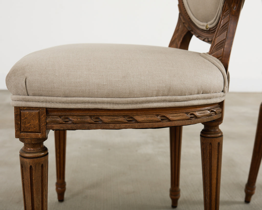 Set of Four French Louis XVI Style Walnut Dining Chairs