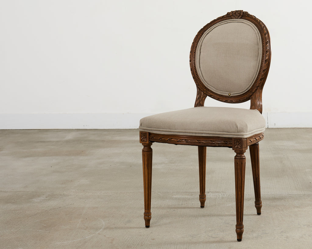 Set of Four French Louis XVI Style Walnut Dining Chairs