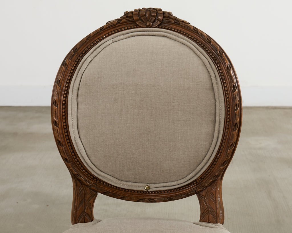 Set of Four French Louis XVI Style Walnut Dining Chairs