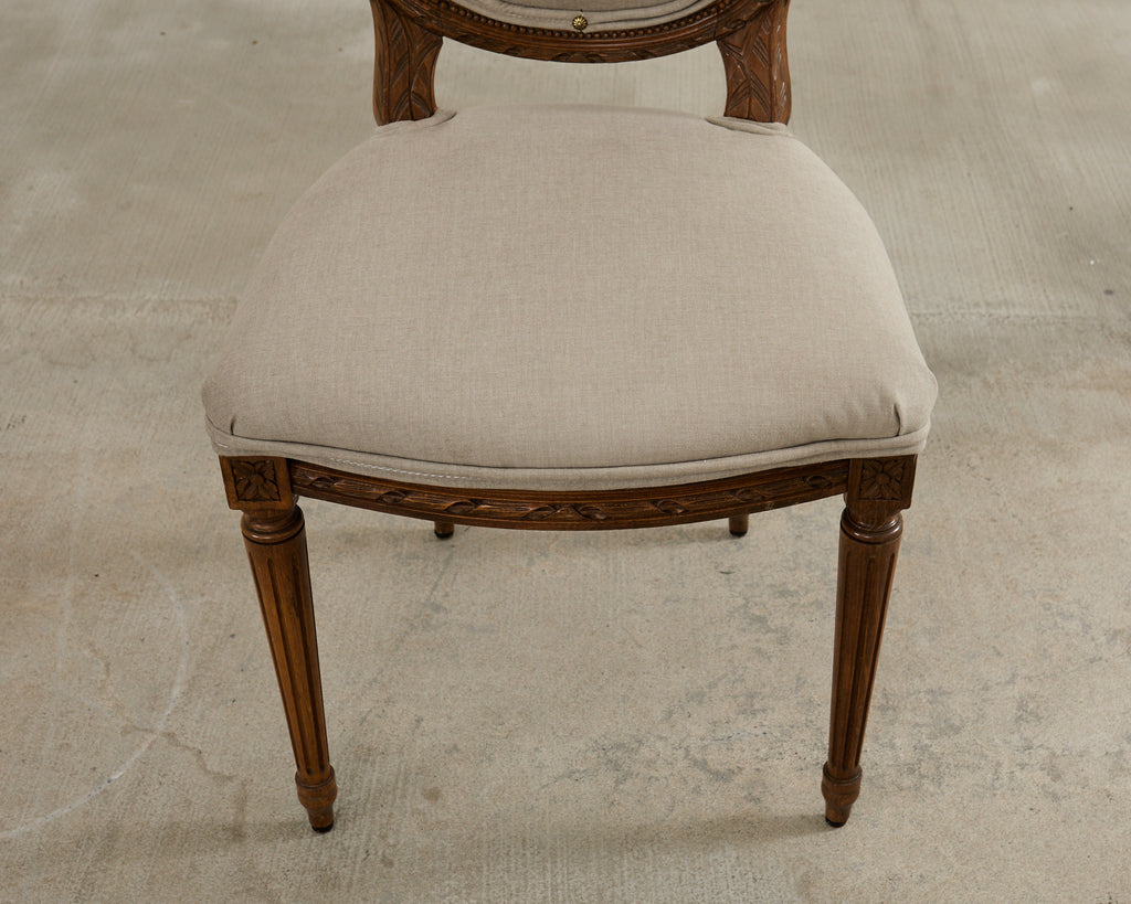 Set of Four French Louis XVI Style Walnut Dining Chairs
