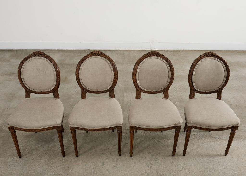 Set of Four French Louis XVI Style Walnut Dining Chairs