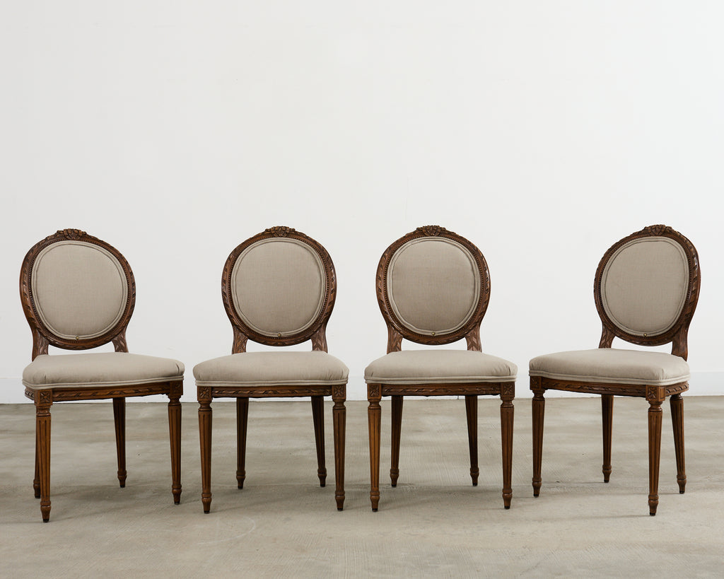 Set of Four French Louis XVI Style Walnut Dining Chairs