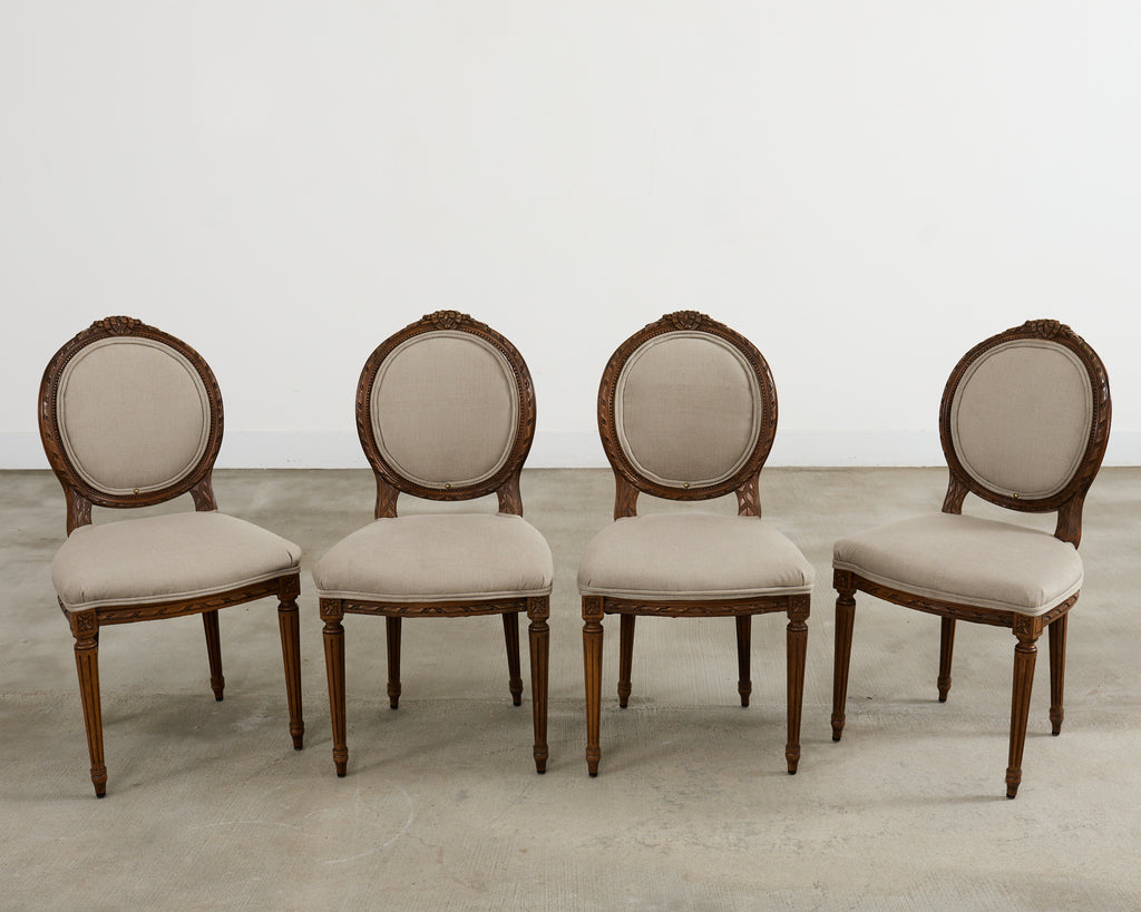 Set of Four French Louis XVI Style Walnut Dining Chairs