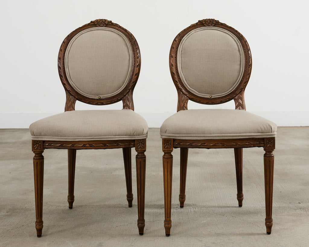 Set of Four French Louis XVI Style Walnut Dining Chairs