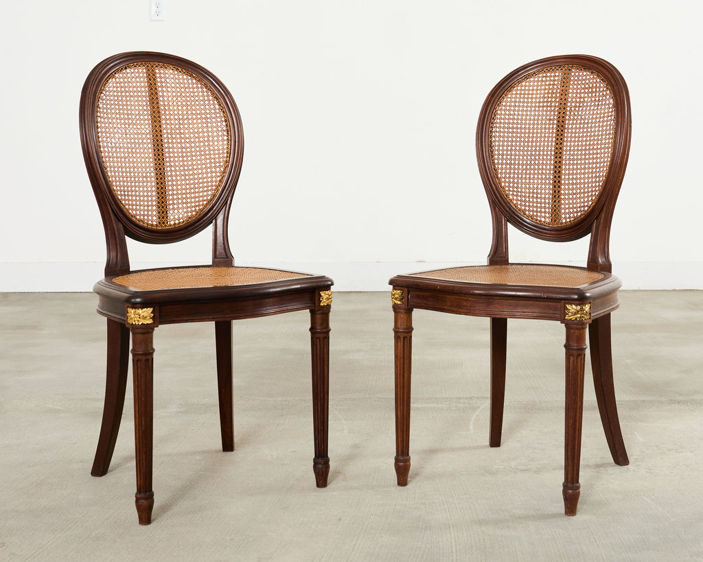 Set of Eight Louis XVI Style Bronze Ormolu Caned Dining Chairs