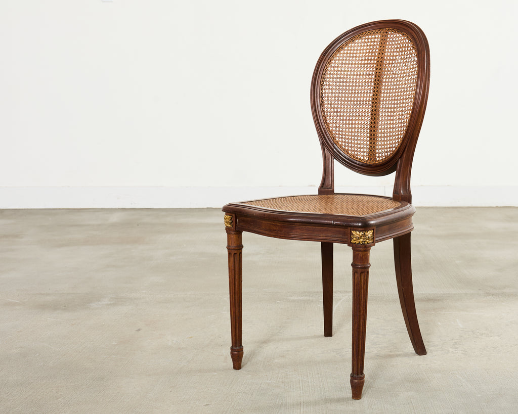 Set of Eight Louis XVI Style Bronze Ormolu Caned Dining Chairs