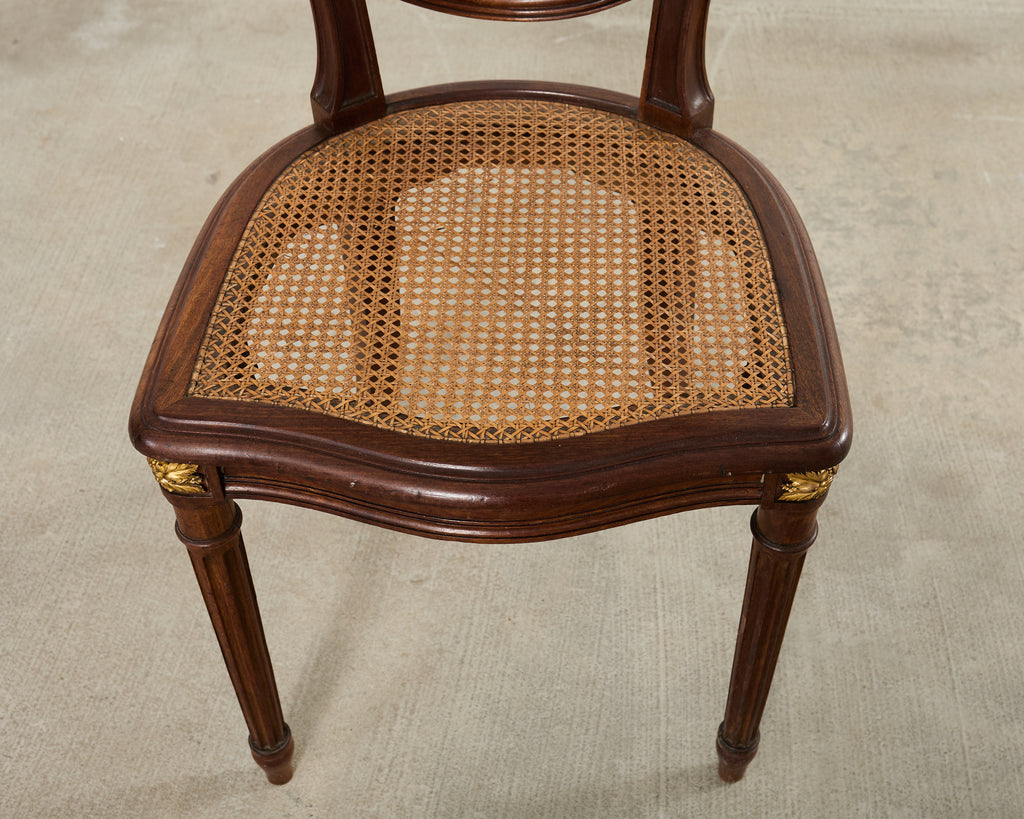 Set of Eight Louis XVI Style Bronze Ormolu Caned Dining Chairs