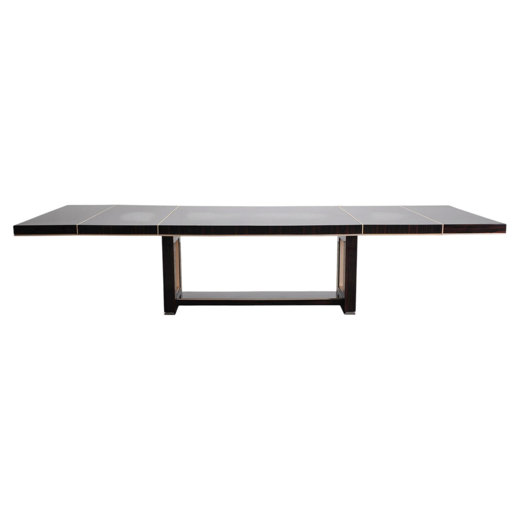A Dakota Jackson modern rectangular dining table with a dark wood top and base, accented by thin gold-toned metal lines.