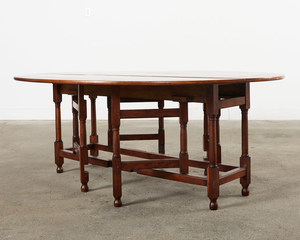 Dennis and Leen Georgian Style Drop-leaf Oval Dining Table