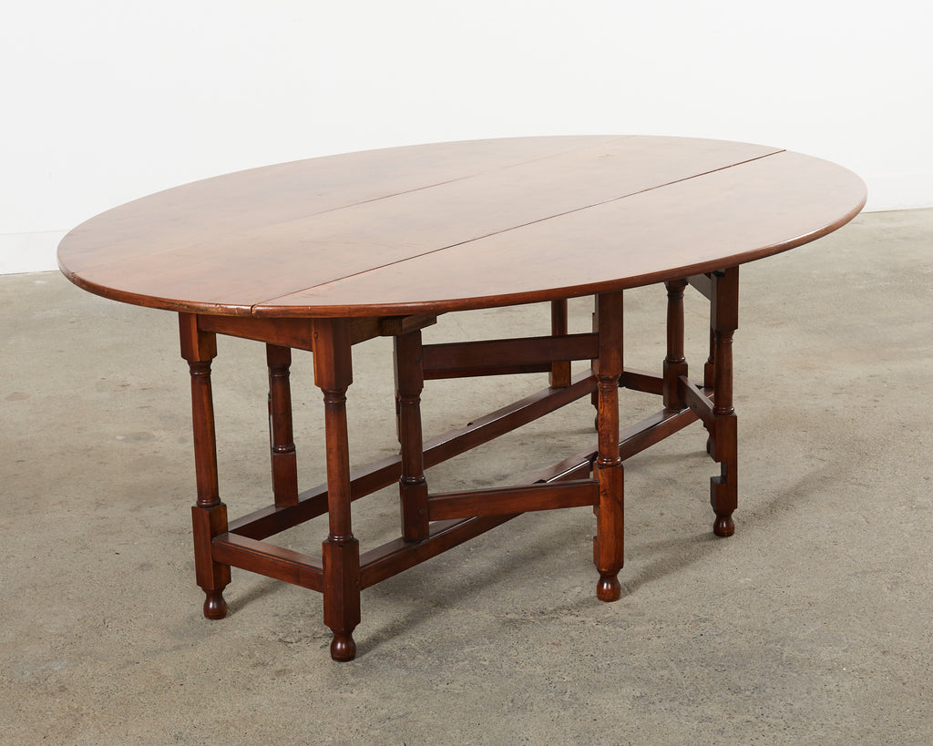 Dennis and Leen Georgian Style Drop-leaf Oval Dining Table