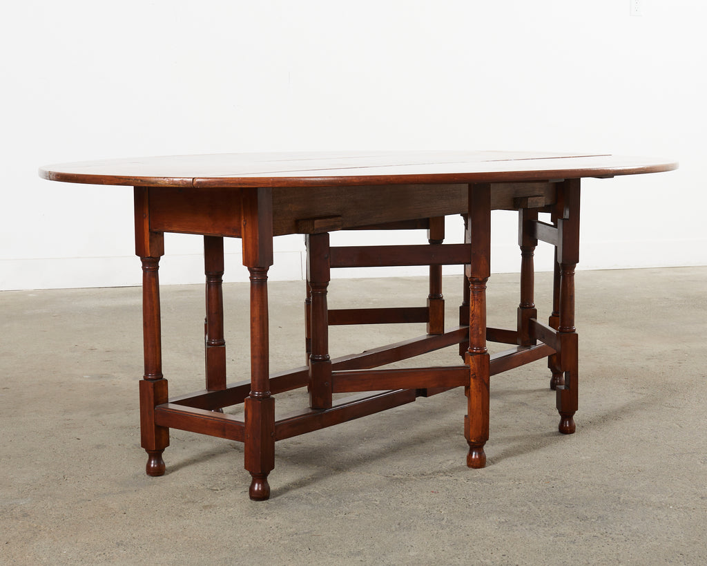 Dennis and Leen Georgian Style Drop-leaf Oval Dining Table