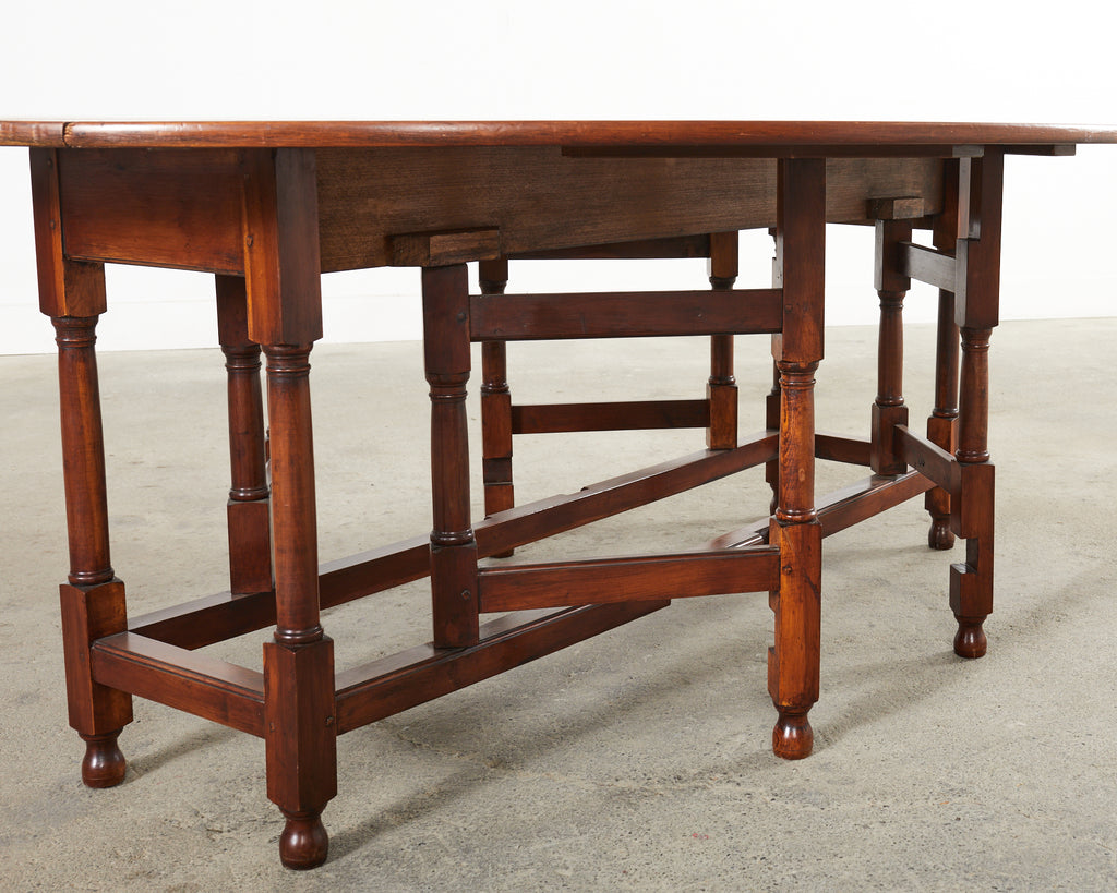 Dennis and Leen Georgian Style Drop-leaf Oval Dining Table