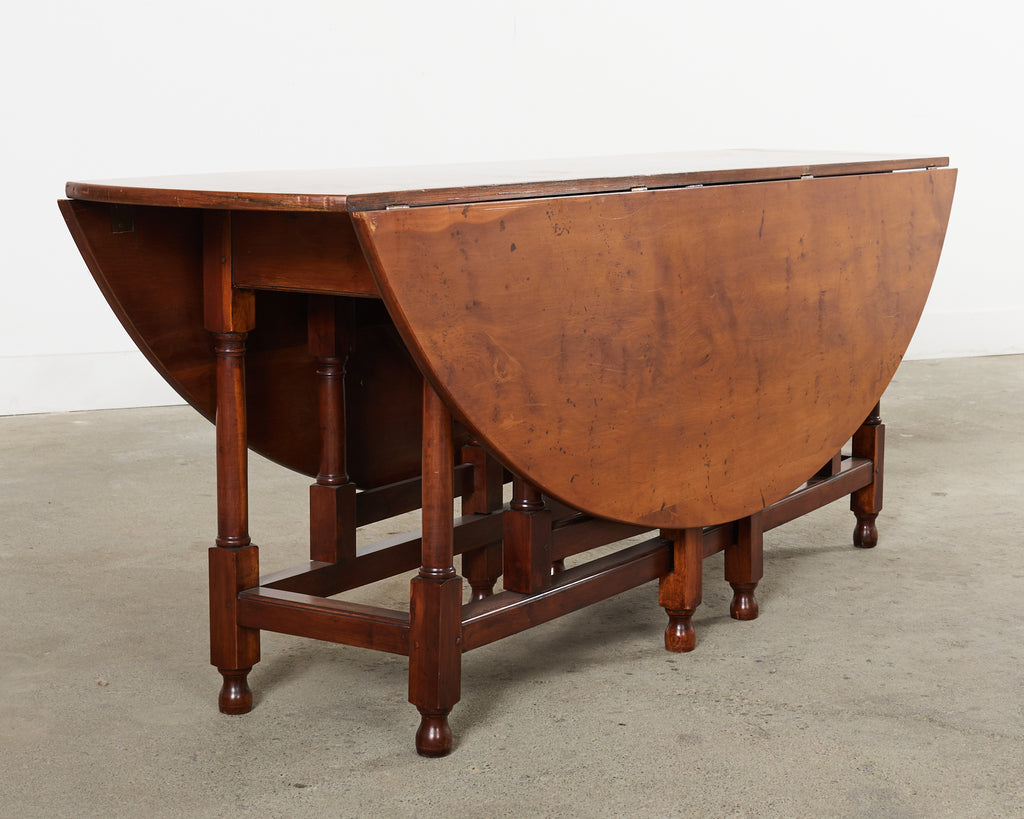 Dennis and Leen Georgian Style Drop-leaf Oval Dining Table