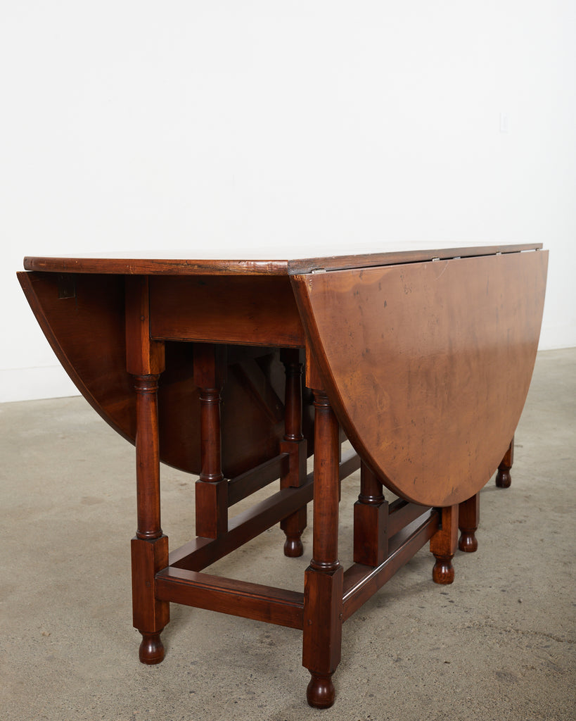 Dennis and Leen Georgian Style Drop-leaf Oval Dining Table