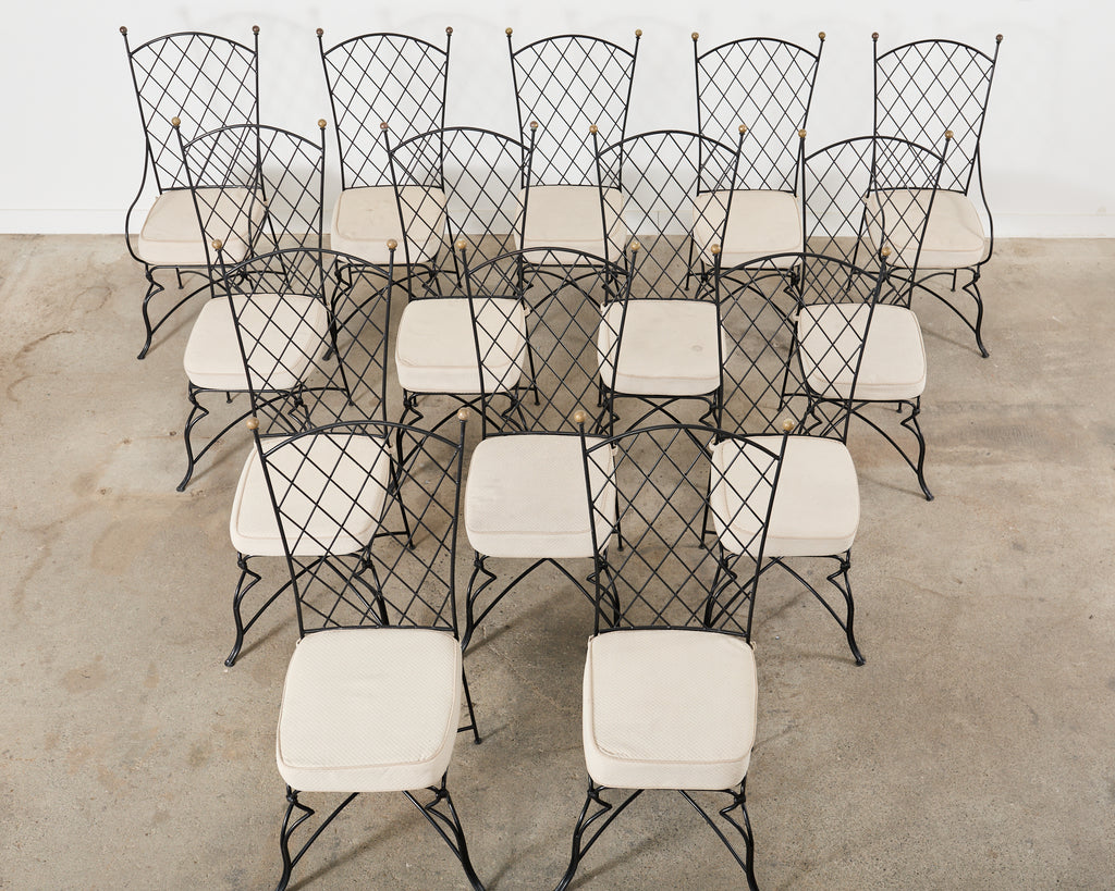 Set of Fourteen Maison Royere Style Iron Garden Dining Chairs
