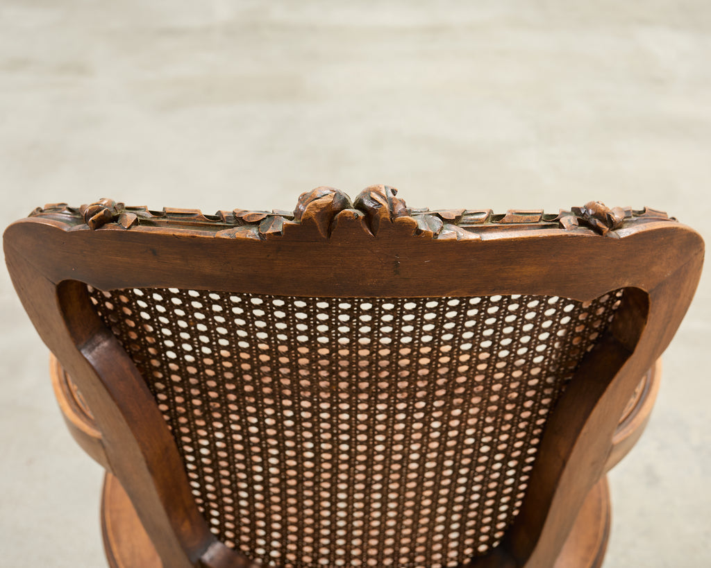 French Louis XVI Style Carved Walnut Cane Fauteuil Armchair