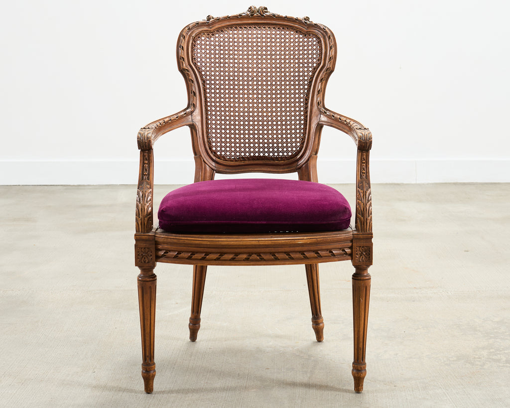 French Louis XVI Style Carved Walnut Cane Fauteuil Armchair