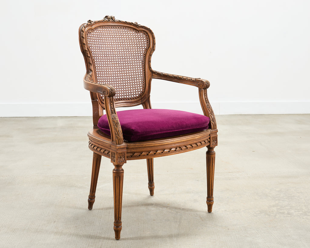 French Louis XVI Style Carved Walnut Cane Fauteuil Armchair