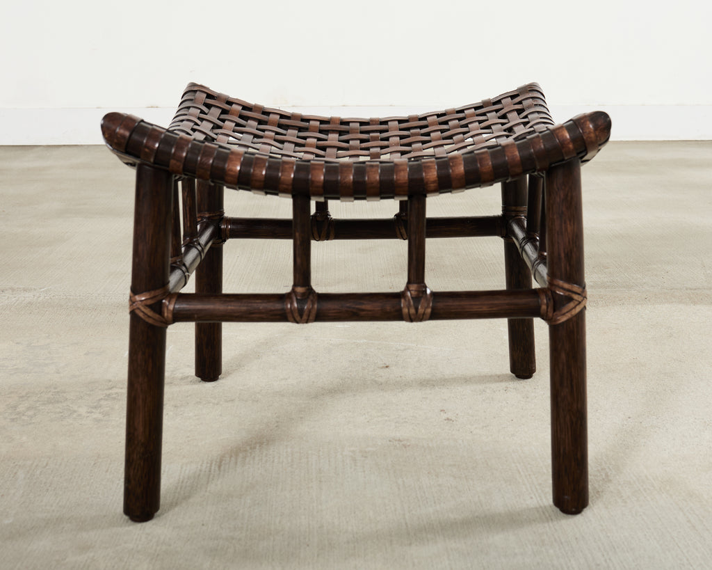 Pair of McGuire Laced Leather Rawhide Rattan Ottoman Stools
