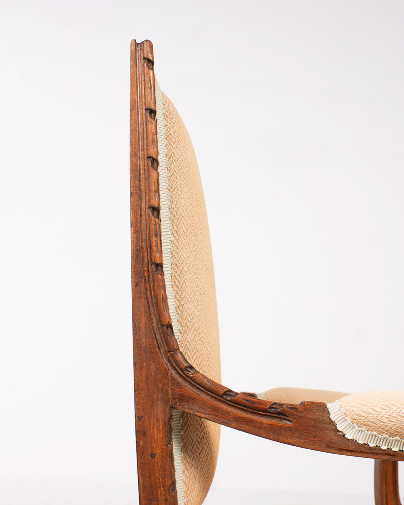 Pair of French Louis XVI Carved Walnut Fauteuil Armchairs