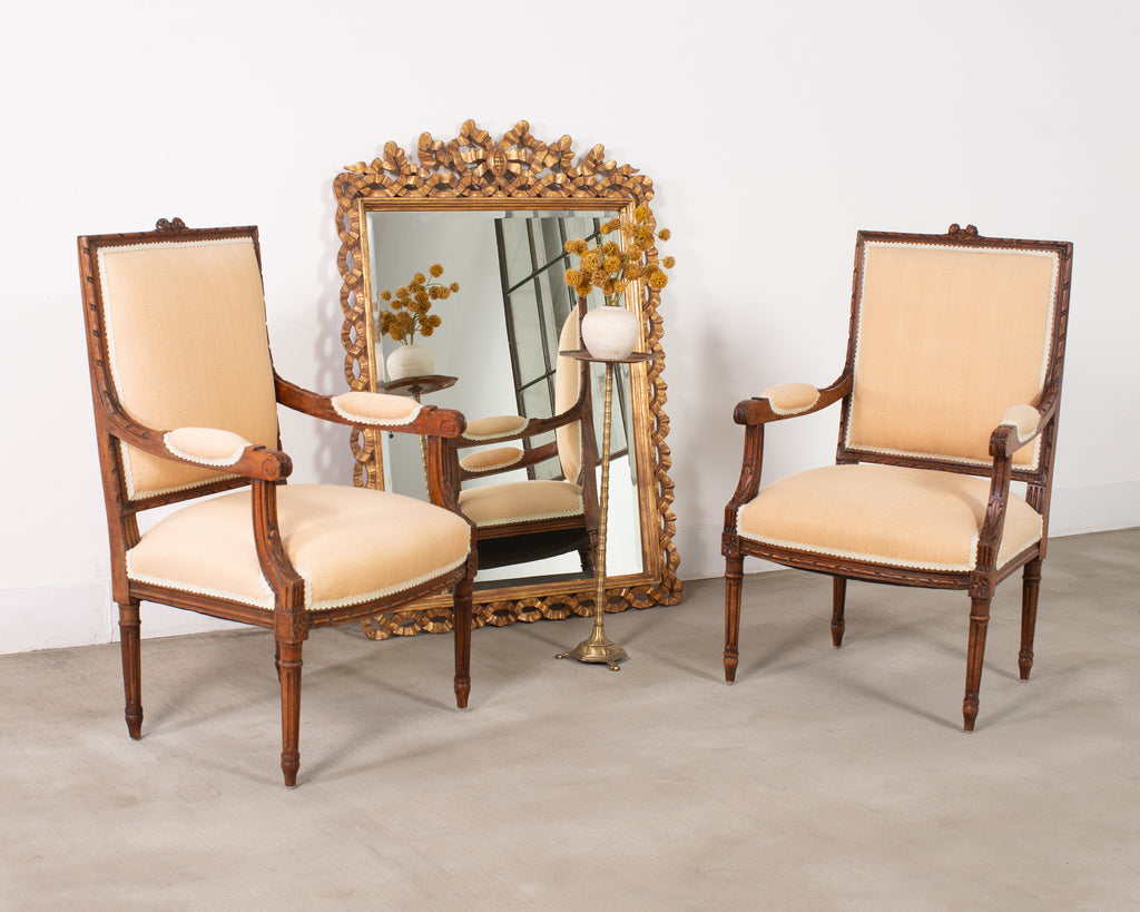 Pair of French Louis XVI Carved Walnut Fauteuil Armchairs