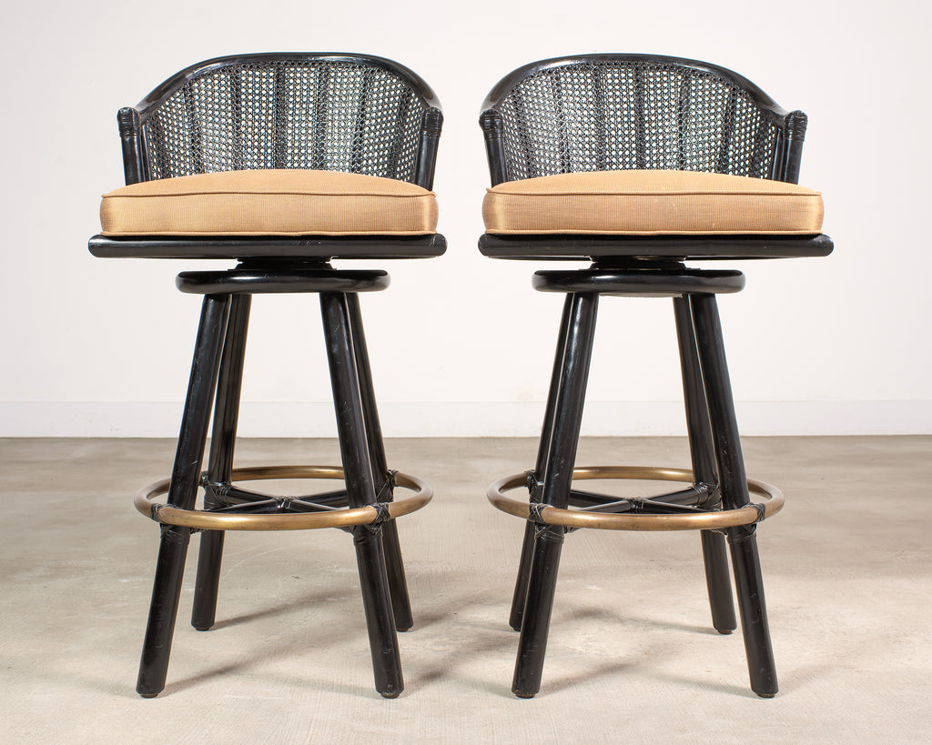 Pair of McGuire Lacquered Rattan Cane Swivel Barstools