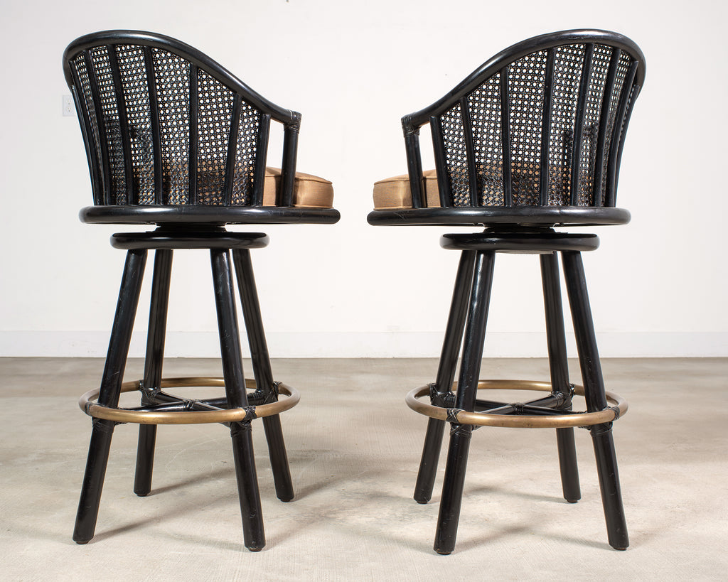 Pair of McGuire Lacquered Rattan Cane Swivel Barstools