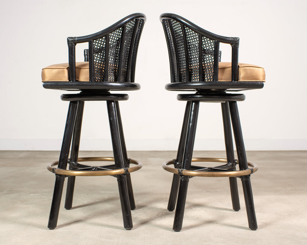 Pair of McGuire Lacquered Rattan Cane Swivel Barstools