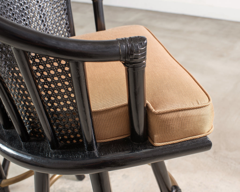 Pair of McGuire Lacquered Rattan Cane Swivel Barstools