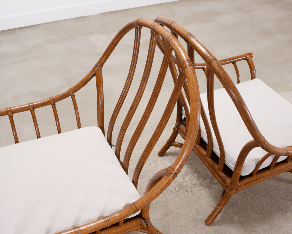 Pair of McGuire Organic Modern Rattan Lounge Chairs + Ottoman