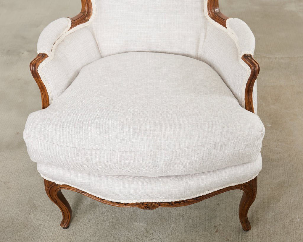 Pair of French Louis XV Style Walnut Bergeres with Linen