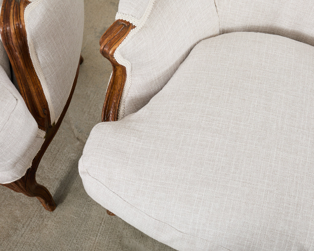 Pair of French Louis XV Style Walnut Bergeres with Linen