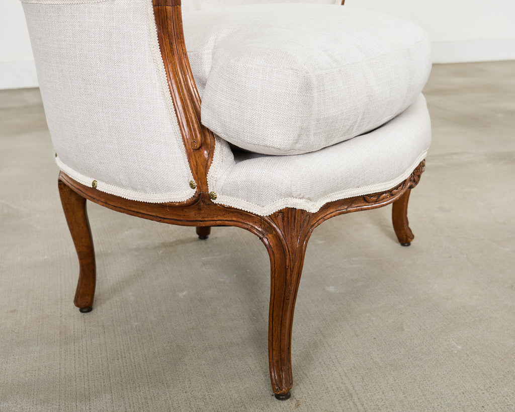 Pair of French Louis XV Style Walnut Bergeres with Linen