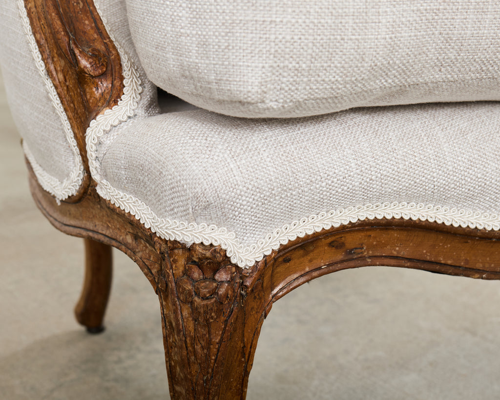 Pair of French Louis XV Style Walnut Bergeres with Linen