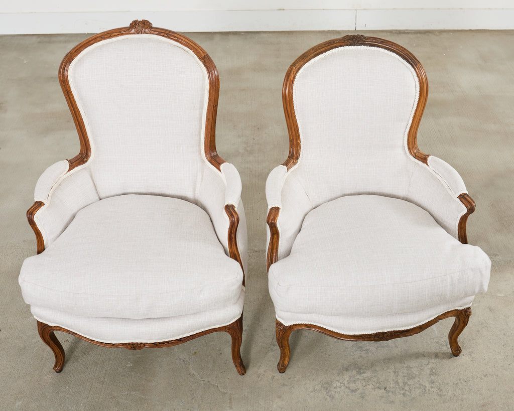Pair of French Louis XV Style Walnut Bergeres with Linen
