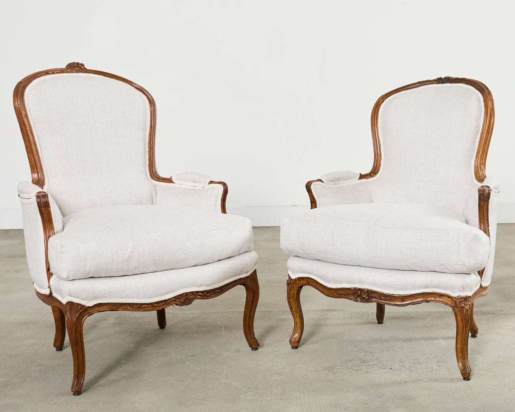 Pair of French Louis XV Style Walnut Bergeres with Linen