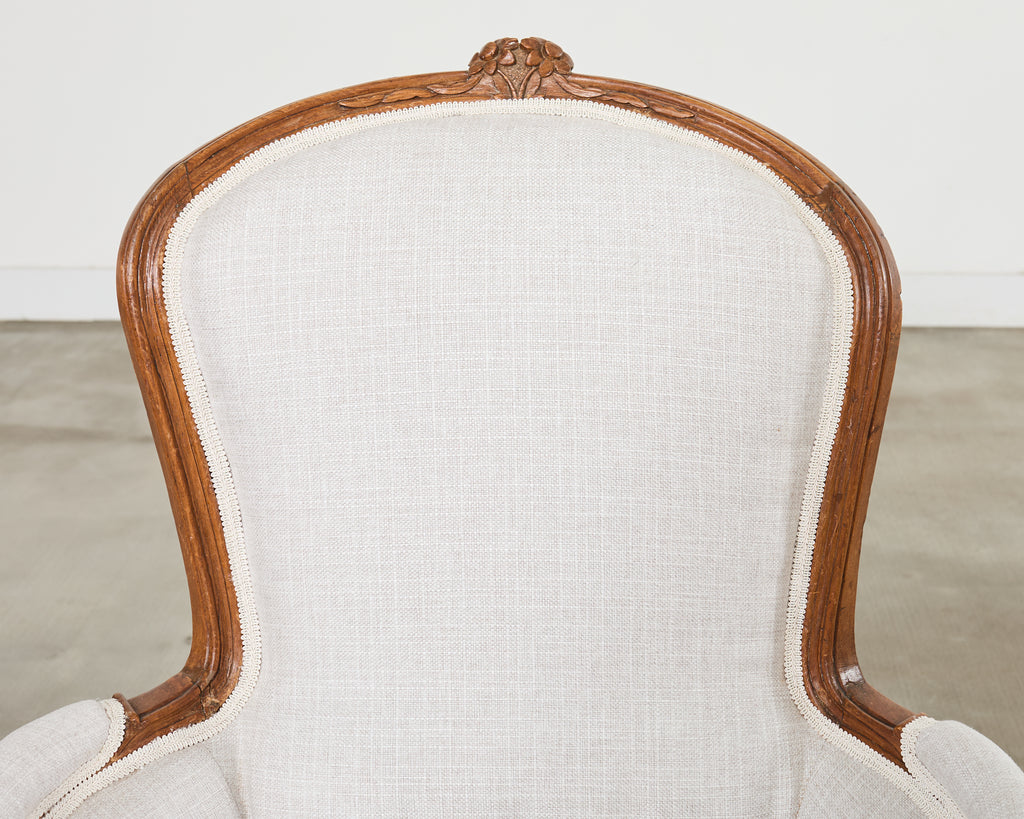 Pair of French Louis XV Style Walnut Bergeres with Linen