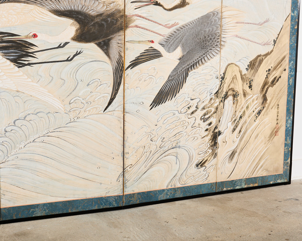 Pair of Japanese Meiji Six Panel Screen Cranes Above Cresting Waves