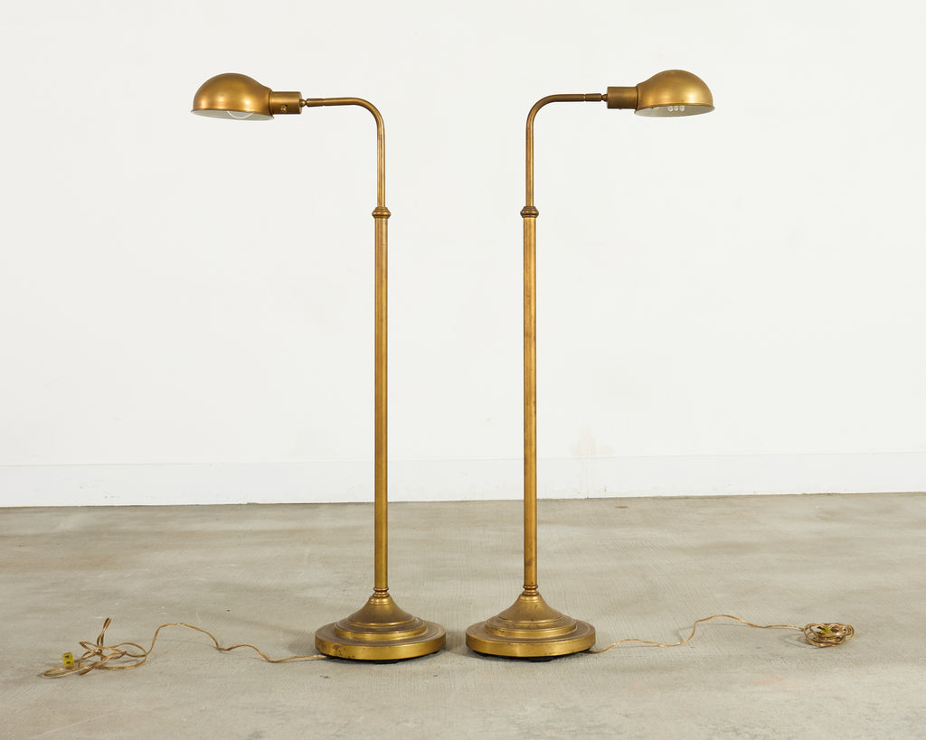 Pair of Patinated Brass Adjustable Pharmacy Floor Lamps