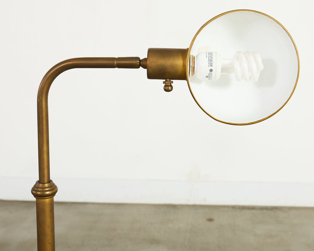 Pair of Patinated Brass Adjustable Pharmacy Floor Lamps