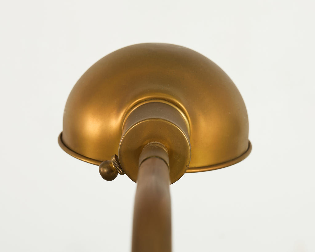 Pair of Patinated Brass Adjustable Pharmacy Floor Lamps